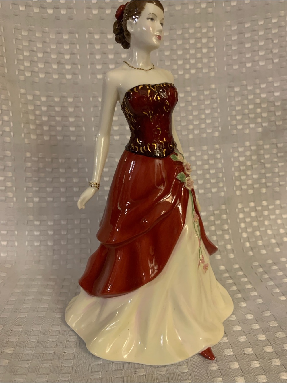 Royal Doulton ‘Emily' from the Pretty Ladies series of figurines. 9 inches tall.